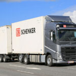 Steel Grey Volvo FH Cargo Truck on Urban Bridge