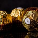 Ferrero,Rocher,Chocolates,Ona,Black,Mirror,Background,,Close,Up,,Advertisement